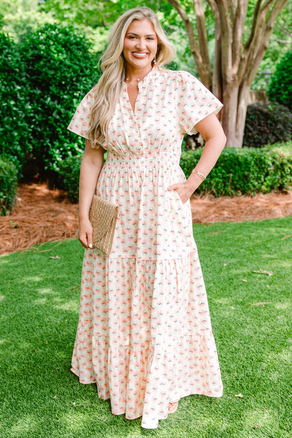 Chic Soul plus size clothing, short sleeve cream maxi dress with V-neck and subtle pink and turquoise abstract pattern