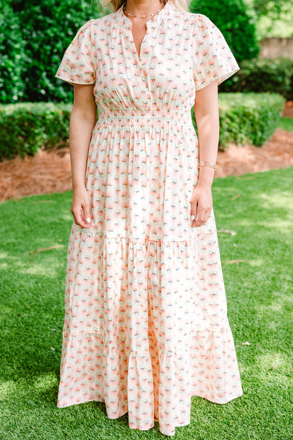 Chic Soul plus size clothing, short sleeve cream maxi dress with V-neck and subtle pink and turquoise abstract pattern