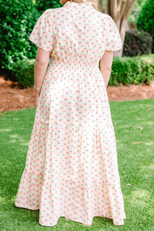 Chic Soul plus size clothing, short sleeve cream maxi dress with V-neck and subtle pink and turquoise abstract pattern