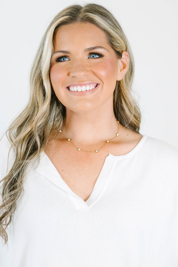 Plus Size gold-plated station necklace with bezel-set cubic zirconia stones on a refined chain.