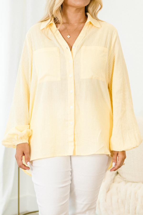 Chic Soul plus size clothing, light yellow long puff sleeve top with collar, button down front, and two breast pockets
