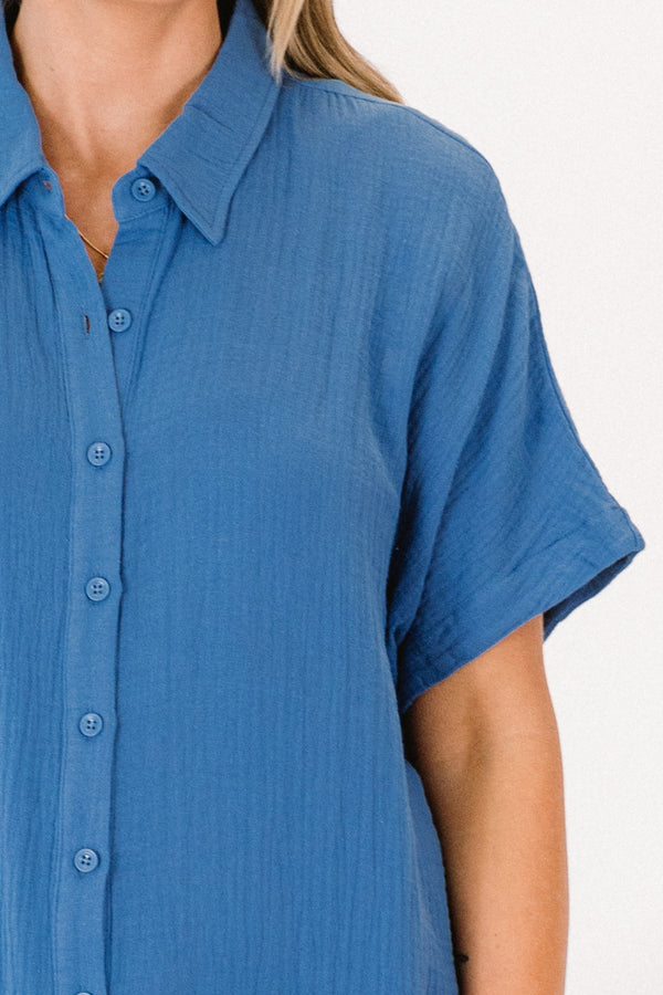 Plus Size navy blue gauze maxi dress with a collared neckline, short sleeves, and button-down front.