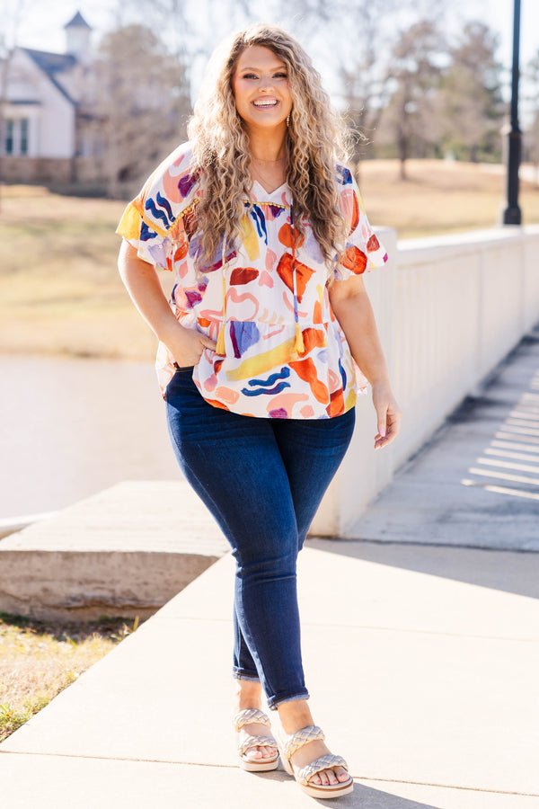 Chic Soul plus size clothing, mustard short sleeve top with v neck and tie detail with tassels and geometric print