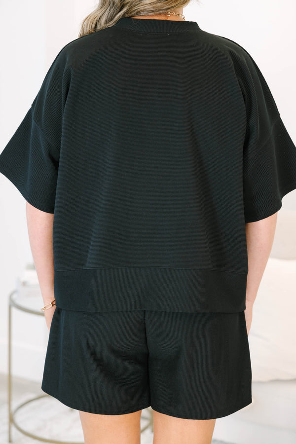 Plus Size black ribbed two-piece set with a boxy drop shoulder top and matching shorts.
