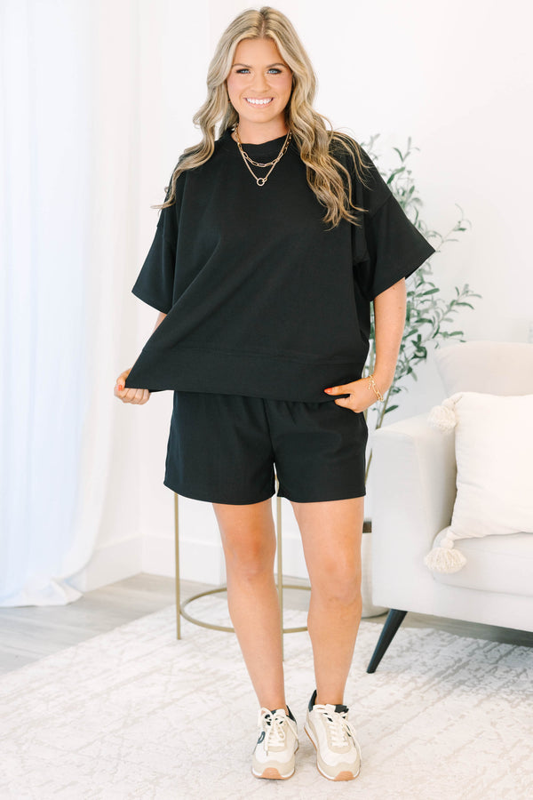 Plus Size black ribbed two-piece set with a boxy drop shoulder top and matching shorts.