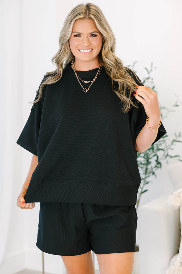 Plus Size black ribbed two-piece set with a boxy drop shoulder top and matching shorts.