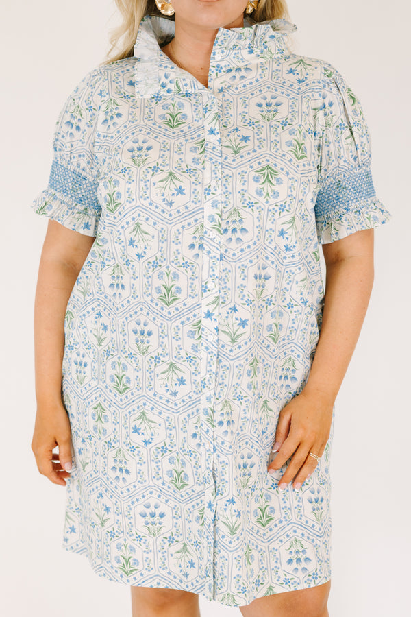 Chic Soul plus size clothing, blue knee length dress with bubble sleeves that have blue stitching details on the ends of sleeves and a floral block pattern throughout 