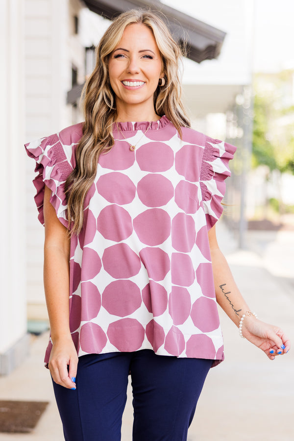 Chic Soul plus size clothing, dark mauve top with short flutter sleeves and smocked neckline with white spotted pattern 