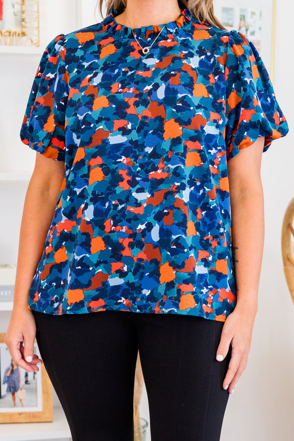 Chic Soul plus size clothing, navy short sleeve top with abstract blue/orange print with puff sleeves and mock neckline