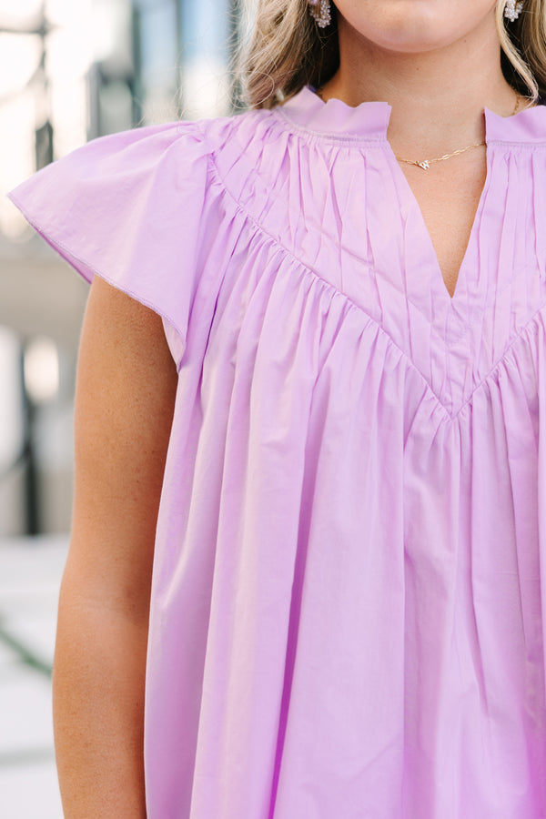Chic Soul plus size clothing, pink top with flutter sleeves that have a pink scalloped detail along each ruffle and scalloped detailing along the v-neckline as well as a floral pattern throughout 
