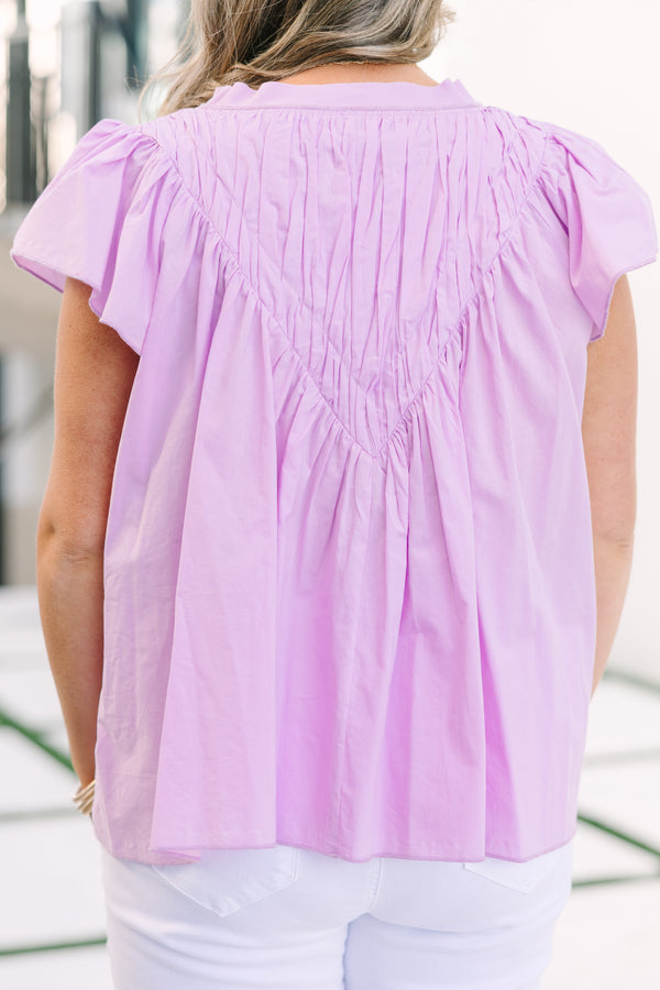 Chic Soul plus size clothing, pink top with flutter sleeves that have a pink scalloped detail along each ruffle and scalloped detailing along the v-neckline as well as a floral pattern throughout 