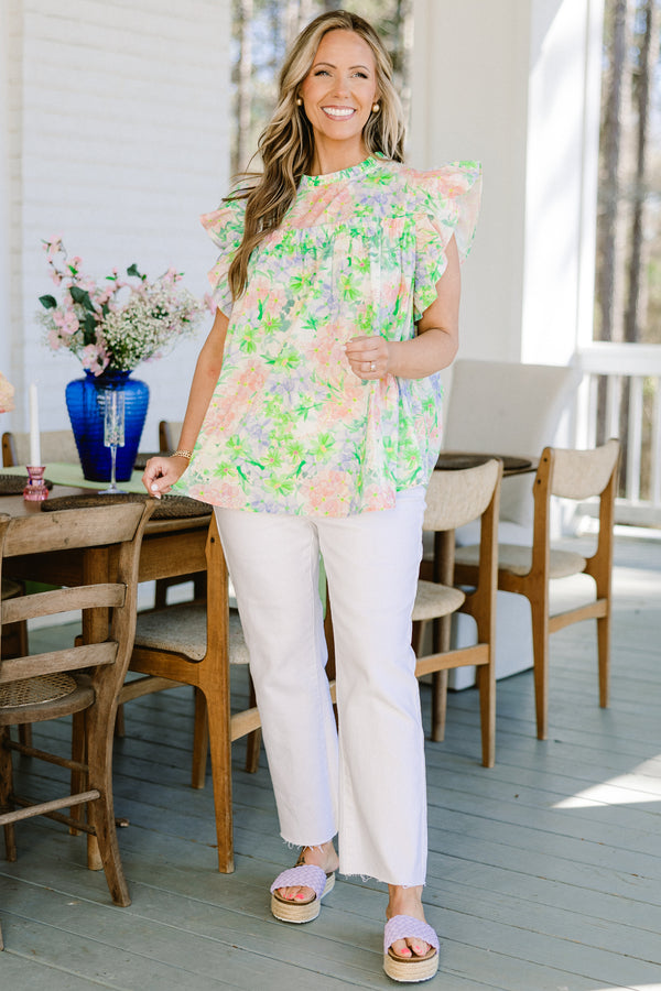 Chic Soul plus size clothing, green floral short sleeve pastel top with pink/purple floral design with mock neck and ruffle sleeves