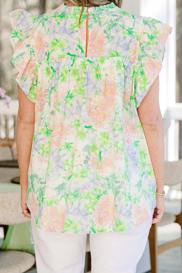 Chic Soul plus size clothing, green floral short sleeve pastel top with pink/purple floral design with mock neck and ruffle sleeves