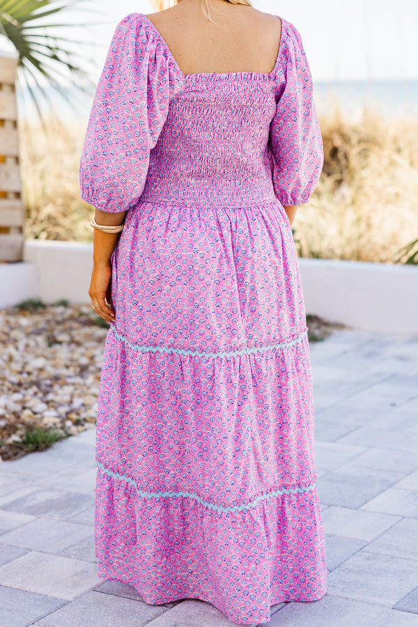 Plus Size pink ditsy floral maxi dress with a smocked bodice, puff sleeves, and tiered ric rac skirt.