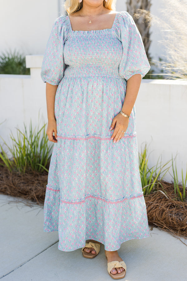  Chic Soul plus size clothing, baby blue tiered maxi dress with half bubble sleeves as well ahad pink scalloped stitching details on the tiers a square neckline and a pink and blue block pattern throughout 
