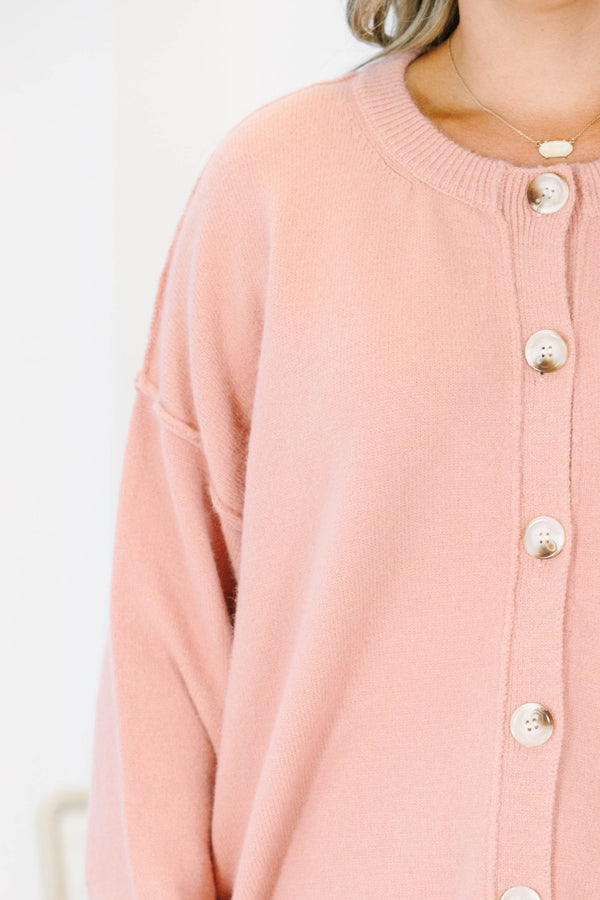 Plus size mauve knit cardigan with a relaxed fit, button-down front, and soft, stretchy fabric.