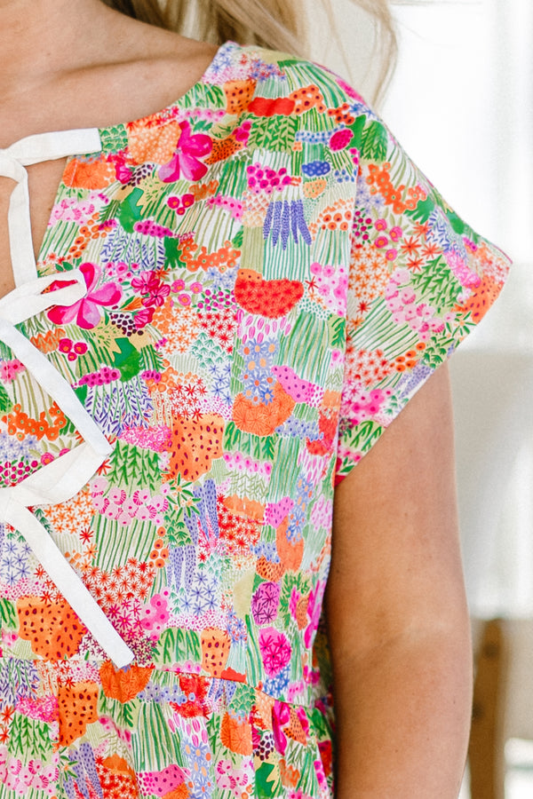Chic Soul plus size clothing, pink floral printed short sleeve top with three white bows in the front