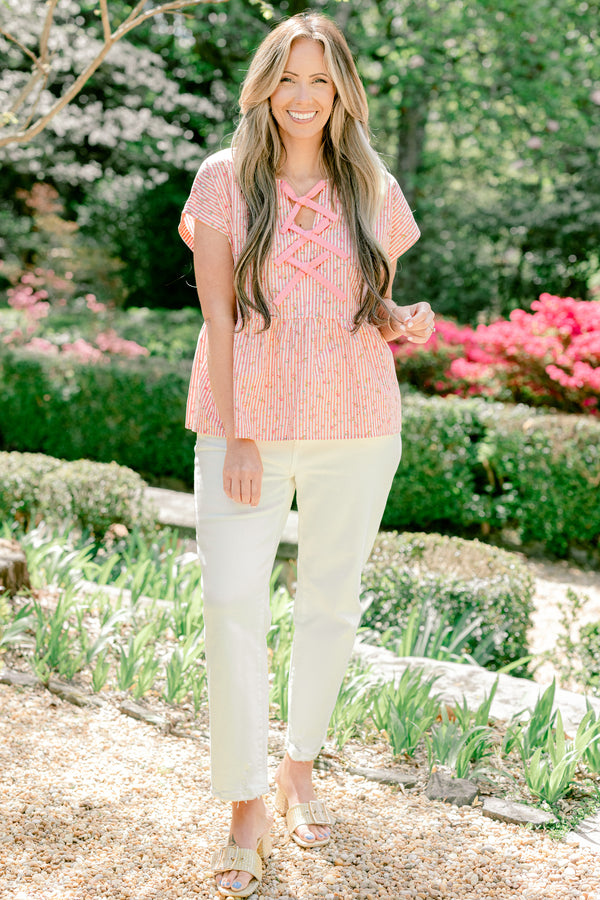 Chic Soul plus size clothing, pink stripe short sleeve top with ruffle along the bottom with bow tie detail along the front