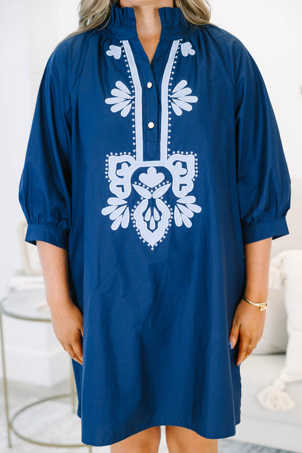 Plus Size blue shift dress with white embroidery, ruffled collar, and three-quarter puff sleeves.