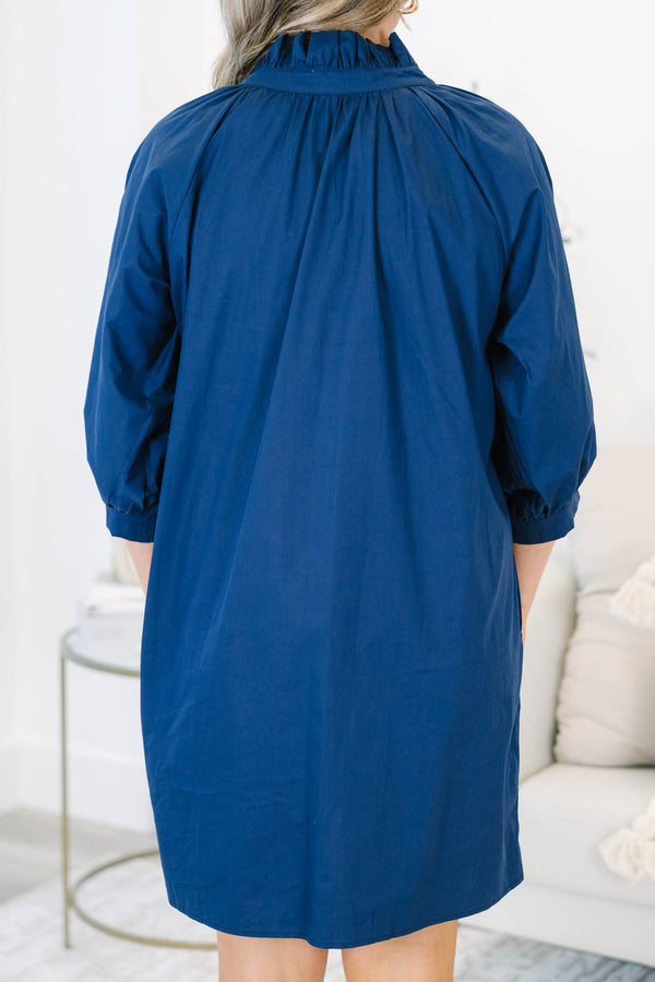 Plus Size blue shift dress with white embroidery, ruffled collar, and three-quarter puff sleeves.