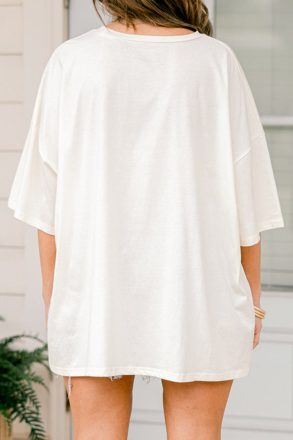 Plus Size ivory oversized boyfriend tee with a USA and bow graphic in a patriotic star pattern.