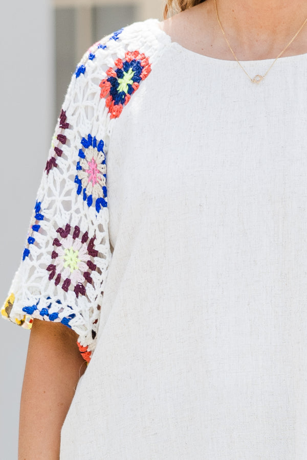 Chic Soul plus size clothing, oatmeal colored top with white multi-colored granny square short sleeves