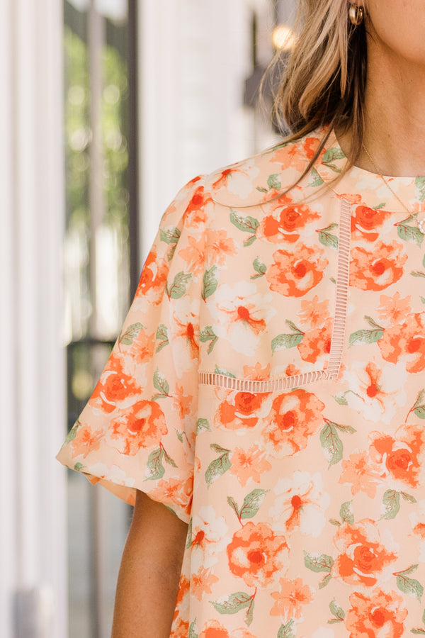 Chic Soul plus size clothing, orange short sleeve flowy top with orange floral print with stitch design along chest