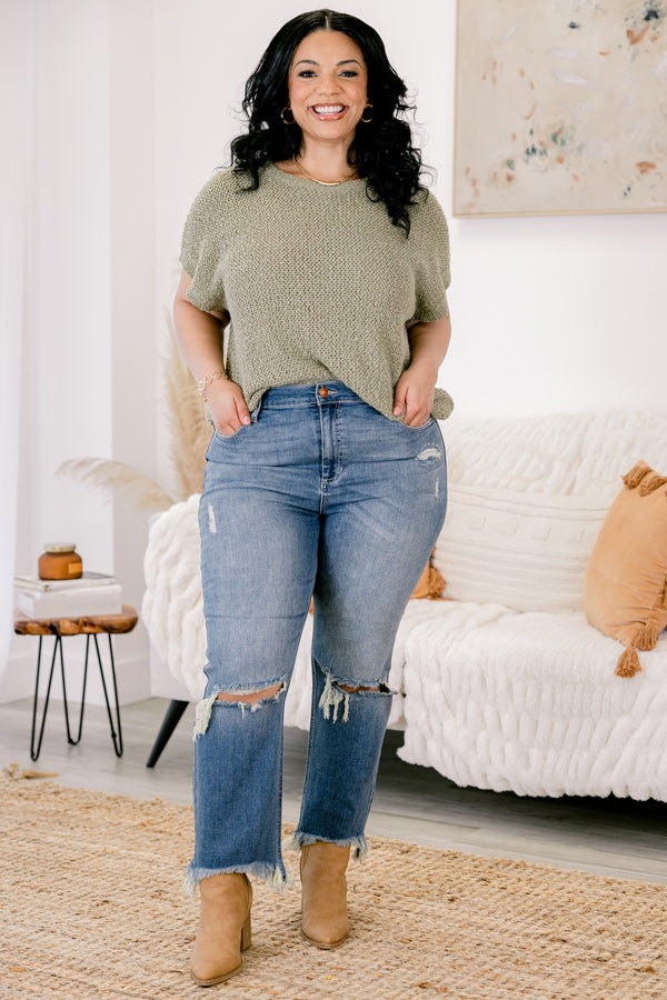 Chic Soul plus size clothing, medium wash distressed denim jeans with rips at the knees and fringe hem