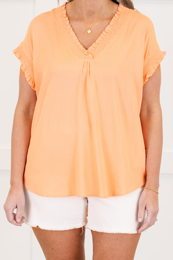 Chic Soul plus size clothing, short-sleeve salmon orange top with a v-neckline and smocked detailing along neckline and sleeves