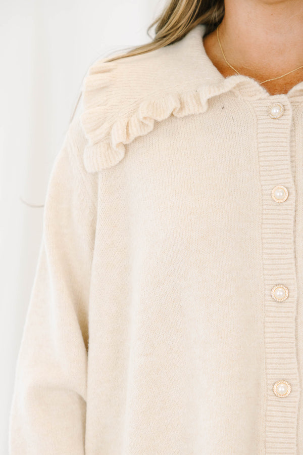 Chic Soul plus size clothing, off-white button up long sleeve cardigan with oversized collar and ruffle detailing on sleeves, hem, and collar