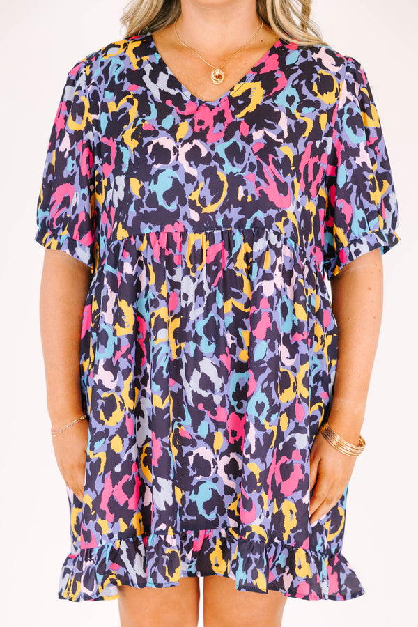 Chic Soul plus size clothing, black abstract pattern with bright colors mini dress with v neck and ruffle detail on bottom with puff sleeves