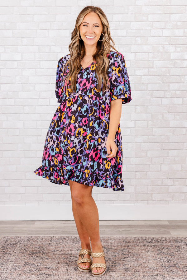 Chic Soul plus size clothing, black abstract pattern with bright colors mini dress with v neck and ruffle detail on bottom with puff sleeves