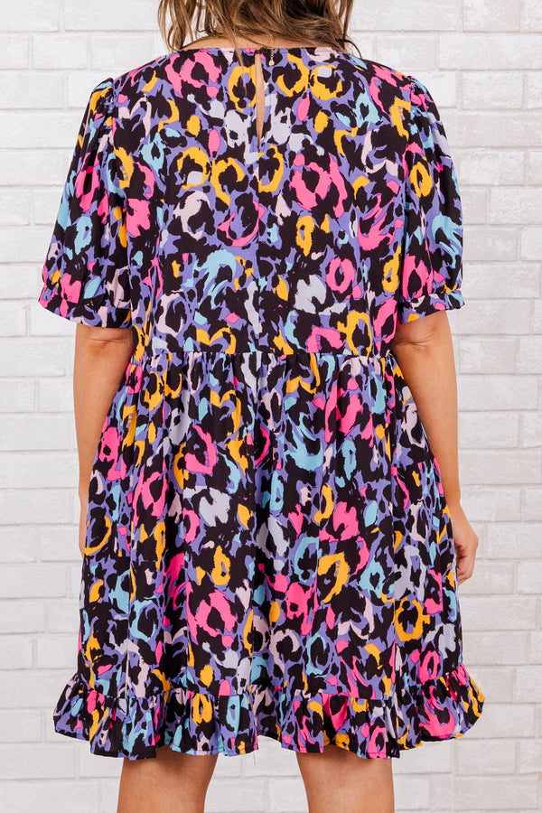 Chic Soul plus size clothing, black abstract pattern with bright colors mini dress with v neck and ruffle detail on bottom with puff sleeves