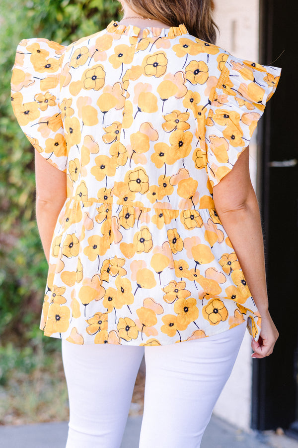 Chic Soul plus size clothing, short-sleeve yellow babydoll top with ruffled sleeves and smocked neckline with yellow floral pattern detailing 