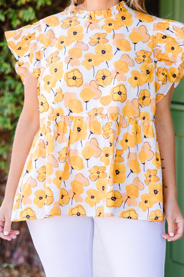 Chic Soul plus size clothing, short-sleeve yellow babydoll top with ruffled sleeves and smocked neckline with yellow floral pattern detailing 