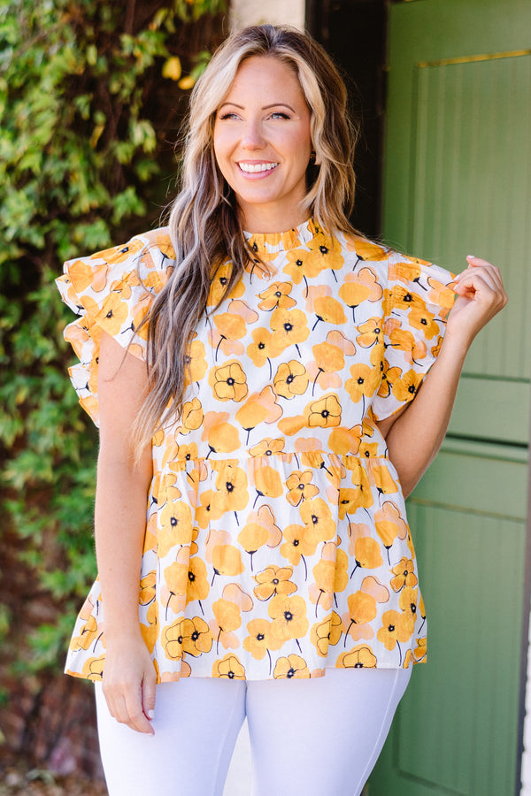 Chic Soul plus size clothing, short-sleeve yellow babydoll top with ruffled sleeves and smocked neckline with yellow floral pattern detailing 