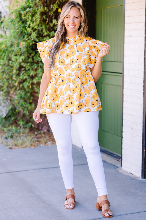 Chic Soul plus size clothing, short-sleeve yellow babydoll top with ruffled sleeves and smocked neckline with yellow floral pattern detailing 