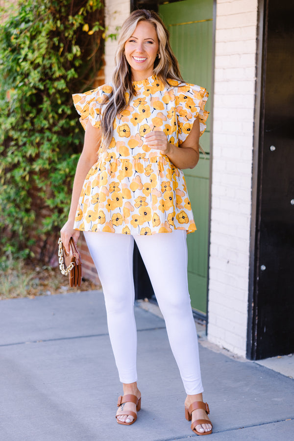 Chic Soul plus size clothing, short-sleeve yellow babydoll top with ruffled sleeves and smocked neckline with yellow floral pattern detailing 