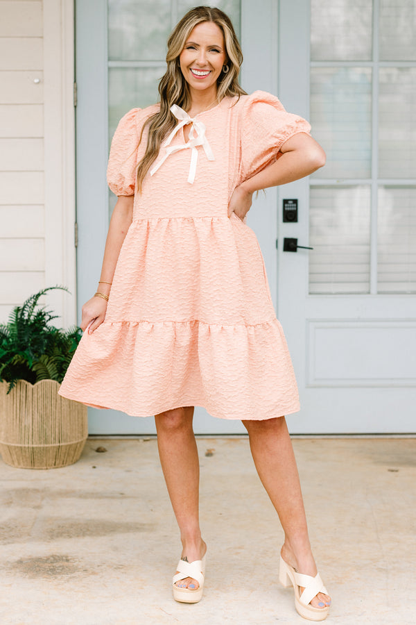 Chic Soul plus size clothing, peach short dress with puff sleeves and two white bows at the neck