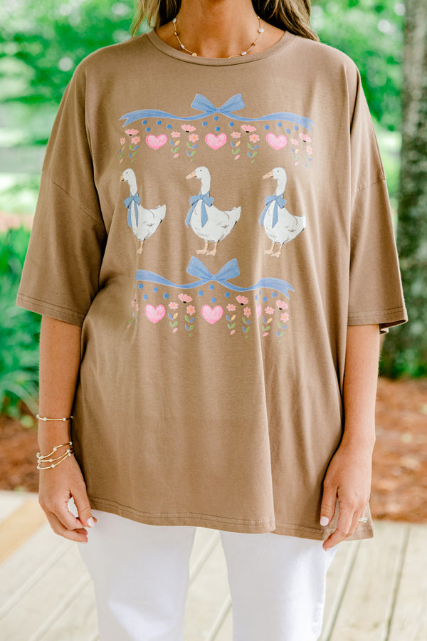 Chic Soul plus size clothing light brown short sleeve graphic tee, with three geese on the center of the shirt with bow accents above them 