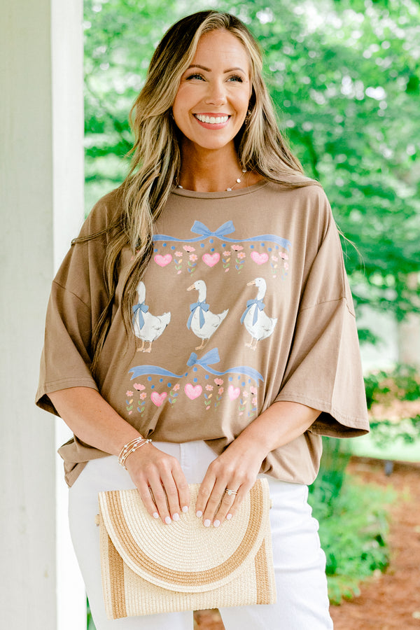 Chic Soul plus size clothing light brown short sleeve graphic tee, with three geese on the center of the shirt with bow accents above them 