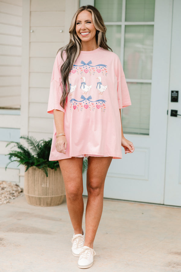 Plus Size dusty pink oversized boyfriend tee with a vintage coquette geese and bow graphic.