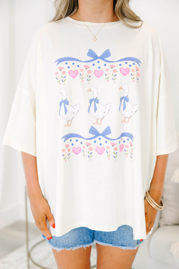 Plus Size ivory boyfriend tee with a graphic of three geese wearing blue bows and pink hearts.