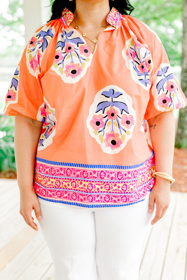 Chic Soul plus size clothing, coral top with bubble sleeves and a block pattern throughout the top