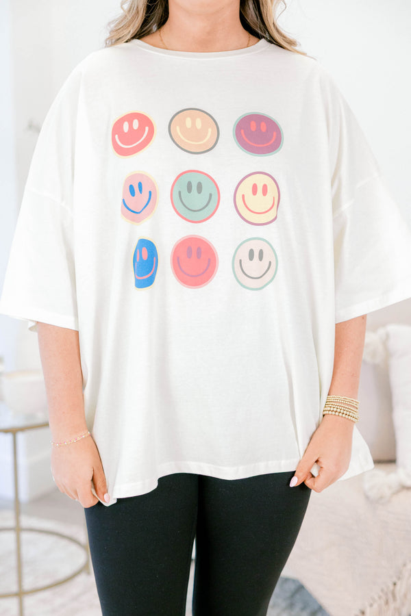 Chic Soul plus size clothing, ivory, oversized, short sleeve t-shirt with multi colored smile face graphics on the front 