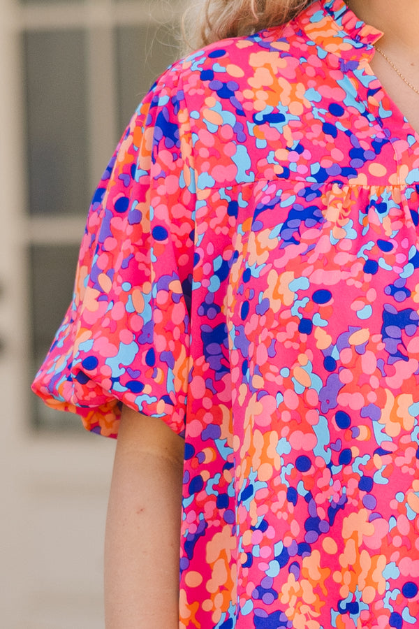 Plus Size hot pink floral top with elastic bubble sleeves and a V-neckline.