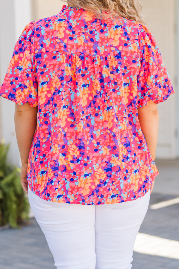 Plus Size hot pink floral top with elastic bubble sleeves and a V-neckline.