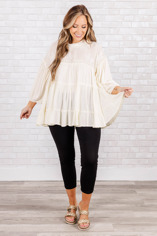 Chic Soul plus size clothing, Cream tiered top with cuff sleeves and lacey detail along neckline with crochet accents on sleeve and neck