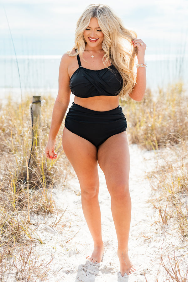 Chic Soul plus size clothing, black bandeau style top with detachable think straps with criss cross fabric detail on the front and clasp detail in the back with gold hardware