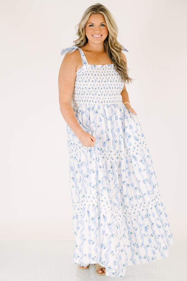 Chic Soul plus size clothing, white maxi dress with a square neckline and ruffle detailed straps with a blue floral pattern throughout 